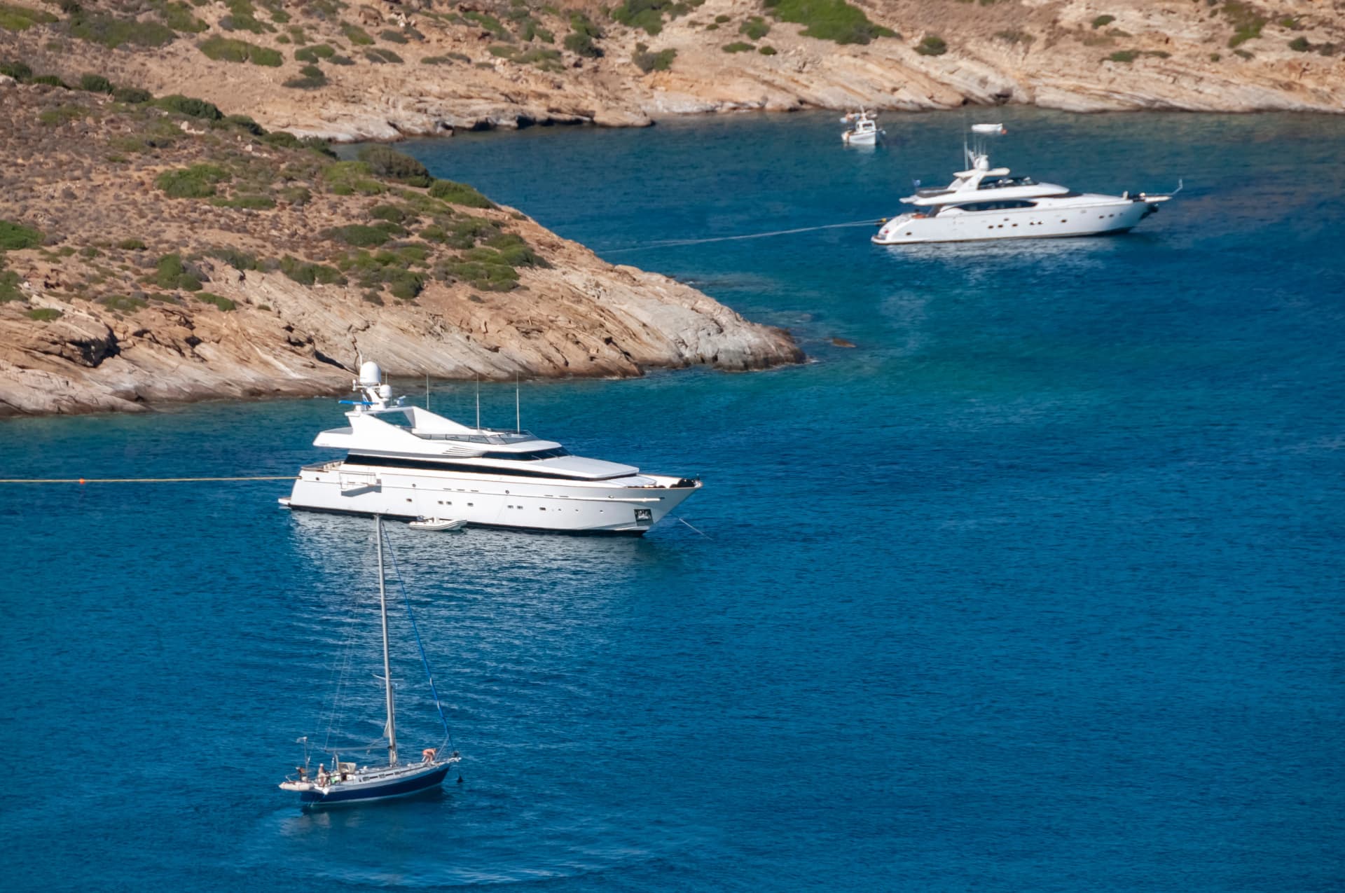 Luxury yachts in bay on south coast Ios Island Greek Islands Greece