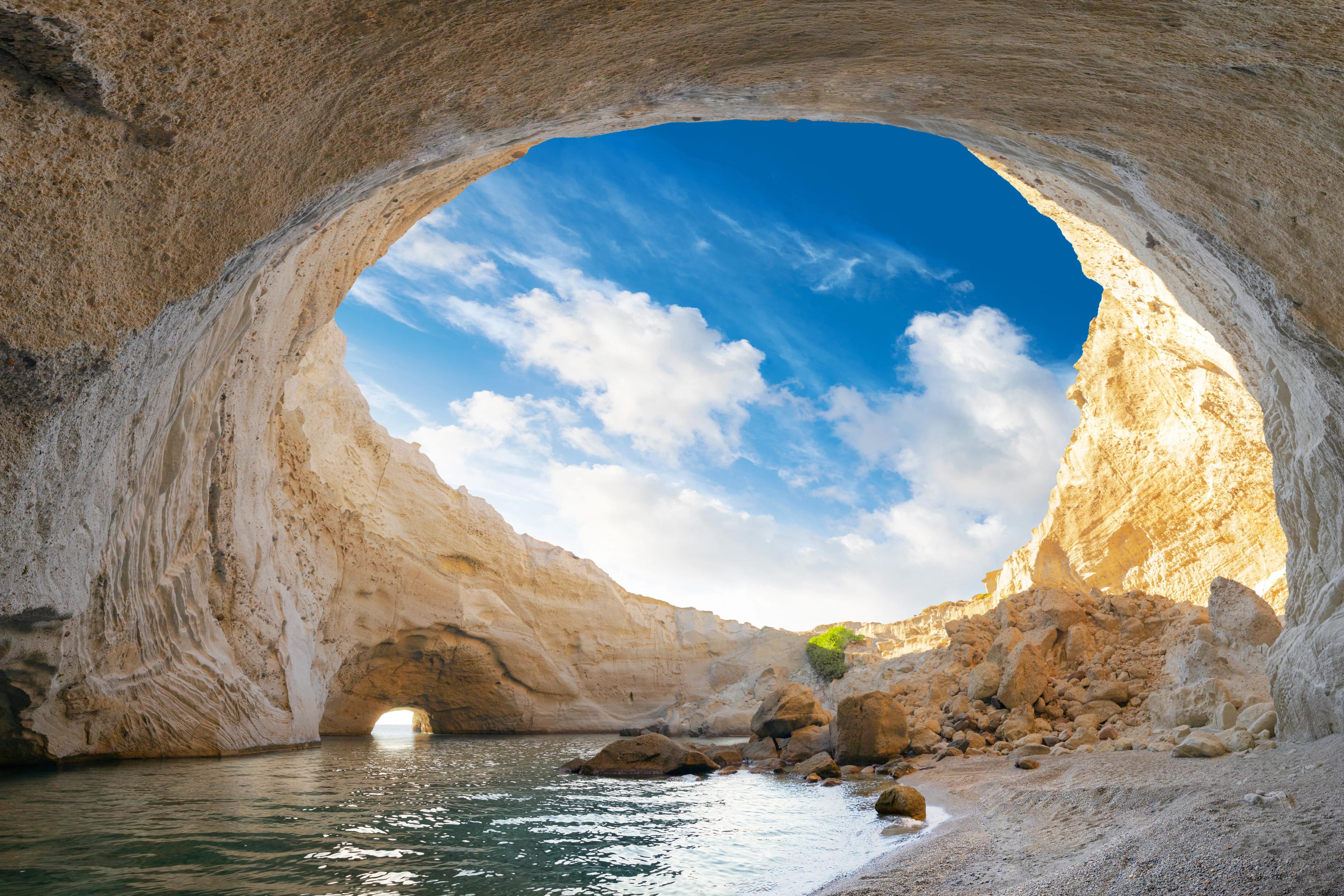 View of the volcanic open cave of Sykia, Milos island, Cyclades, Greece