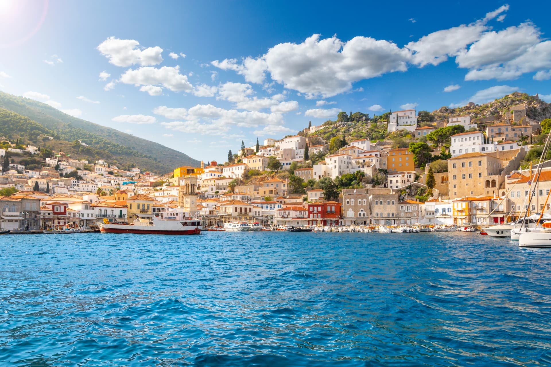 The harbor and port at the Greek island waterfront village of Hydra, one of the Saronic islands of Greece.