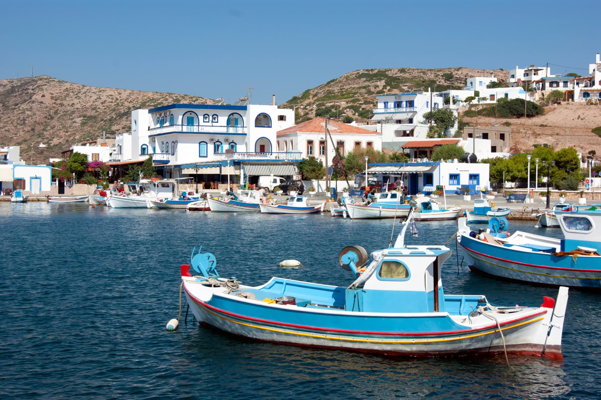 Greece – Lipsi island. Small, traditional fishing boats at anchor in the harbor.