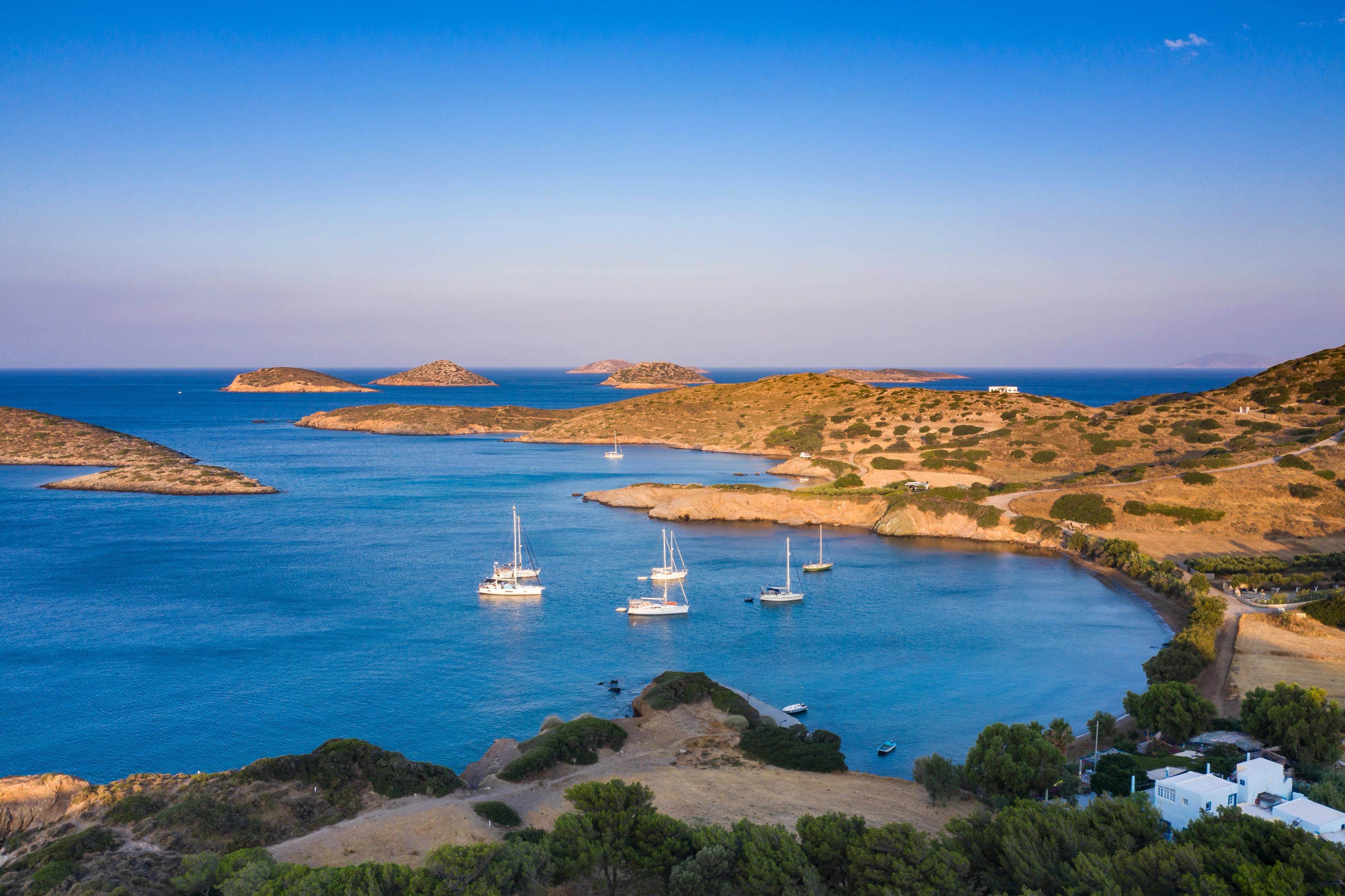 Early morning view of sailboats anchored in a bay in Lipsi Greece