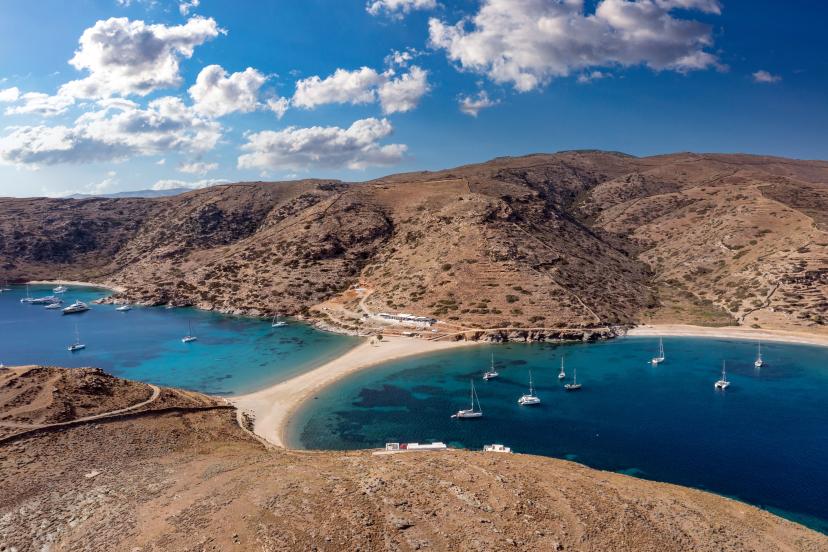 Kolona Fykiada double sided sandy beach, aerial drone view. Greece, Kithnos island, Cyclades.